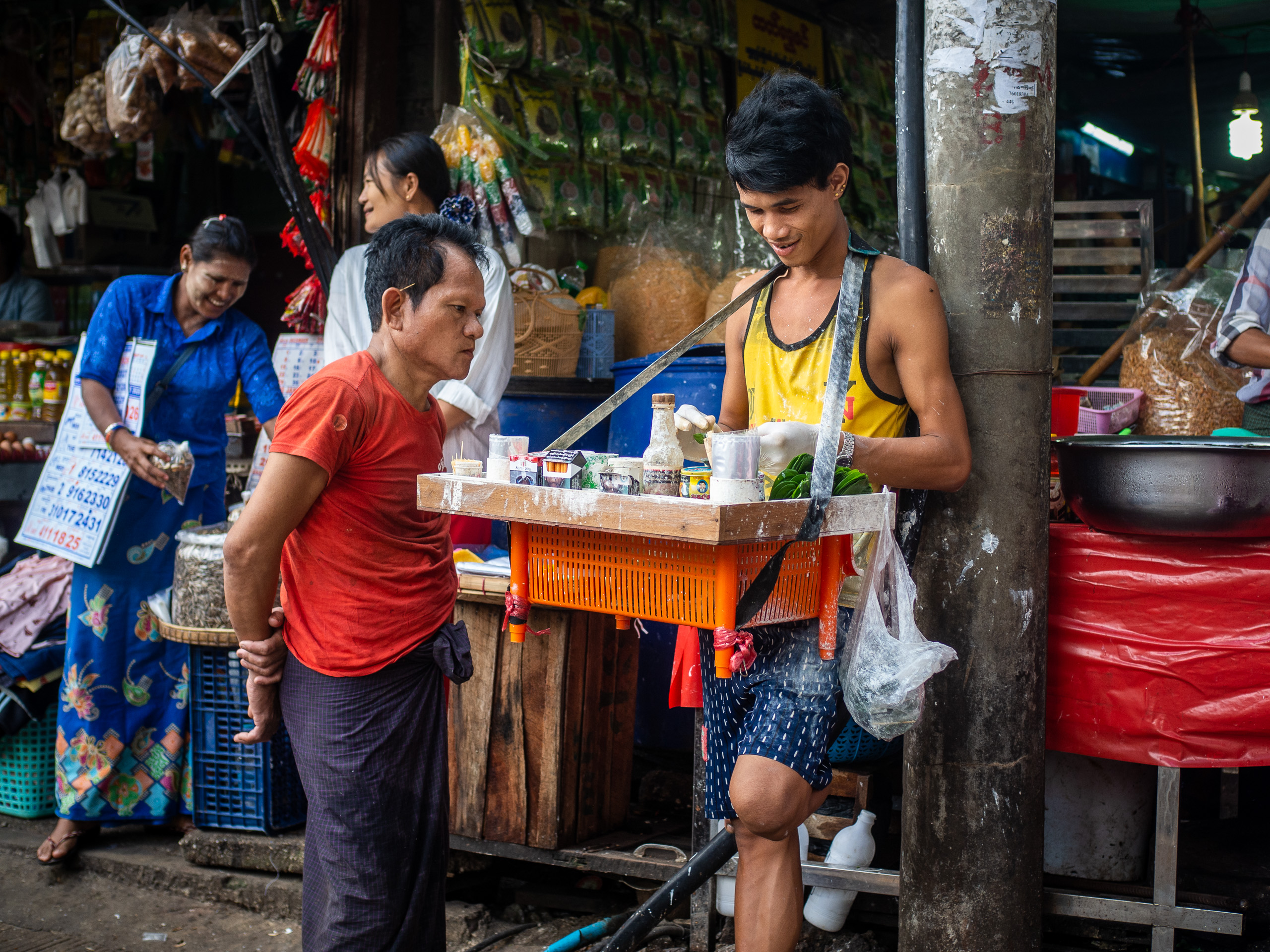 Yangon - Myanmar - people in the street - local betel nut dealer